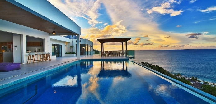 Modern Architectural Luxury Ocean View Villa in St Martin - Pool and Ocean Views at Dusk