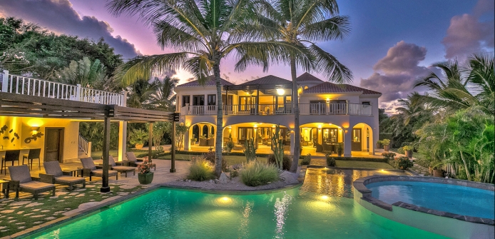Arrecife 4 Bedroom Ocean View Luxury Golf Villa In Punta Cana - Villa Pool and Exterior at Night